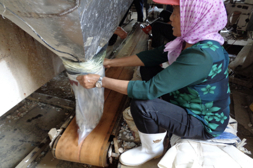 Load into the bags in discharge hole